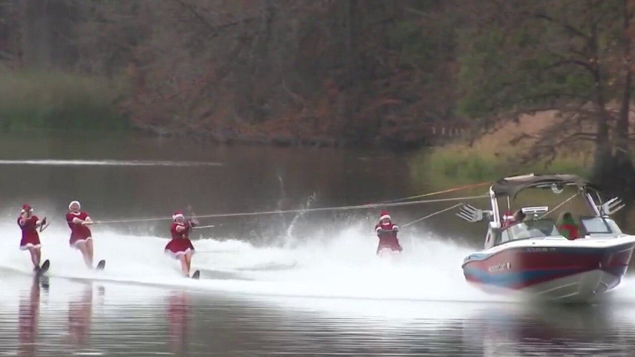 Santa's helpers water ski on Lake Austin