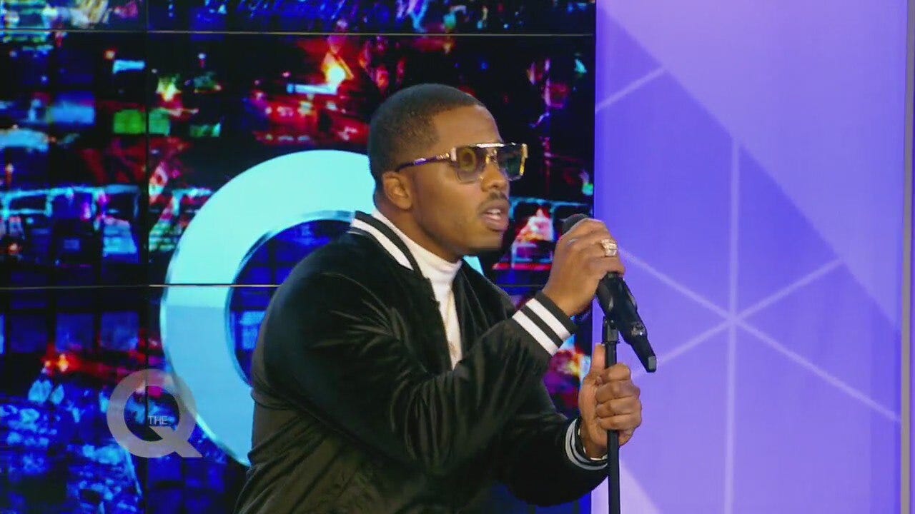 Singer J. Brown performs on The Q Show