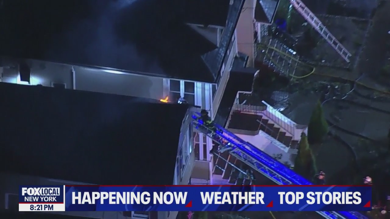 4-alarm fire tears through three multi-family homes in Roselle, New Jersey