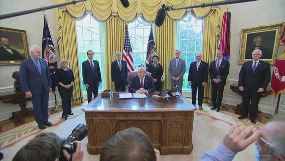 Trump signs $484 billion measure to aid employers, hospitals