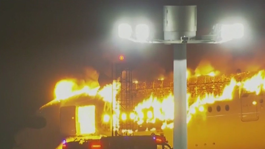 Japan deals with fiery plane collision, deadly earthquake