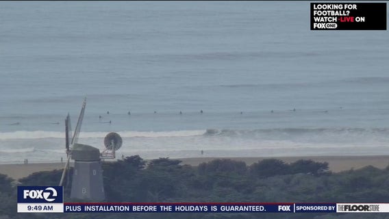 Mostly cloudy, showers increasing