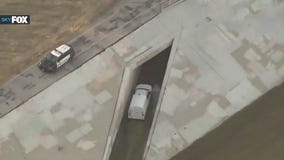 Van pulls into storm drain mid-police chase