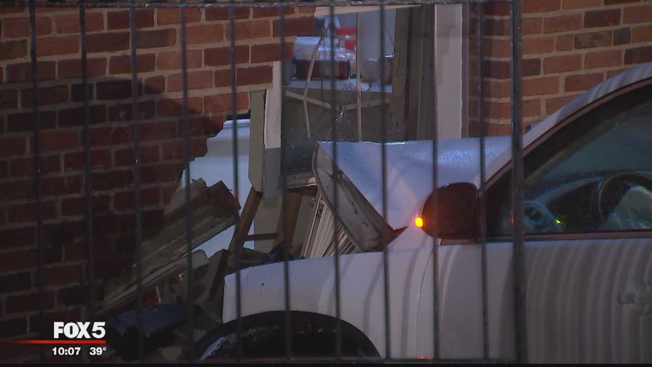 SUV crashes into apartment building in Bethesda