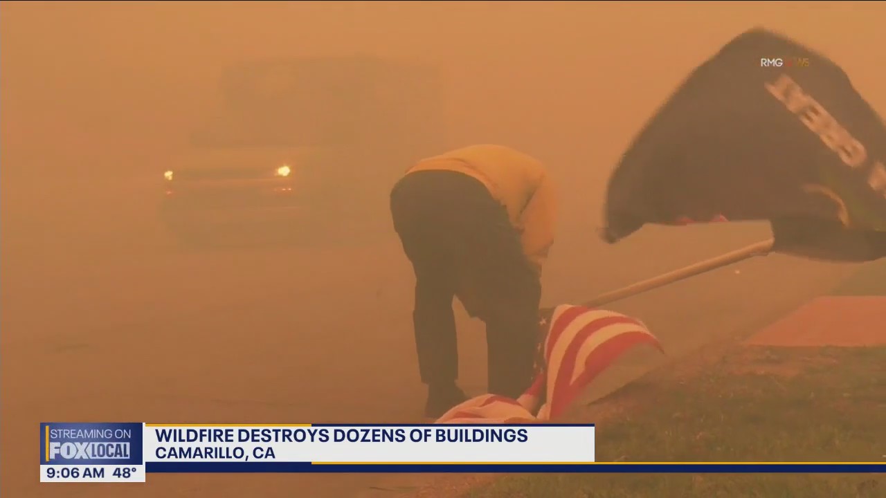 Powerful winds fuel CA wildfire, dozens of buildings destroyed