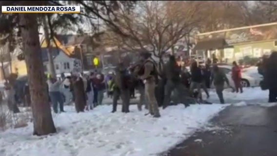 Federal agents at Minneapolis school spark chaotic scene