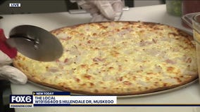 Serving up pizza at The Local