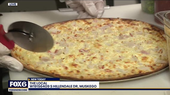 Serving up pizza at The Local