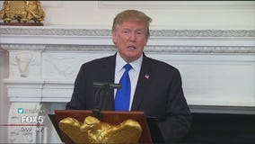 Trump heads to summit with Kim