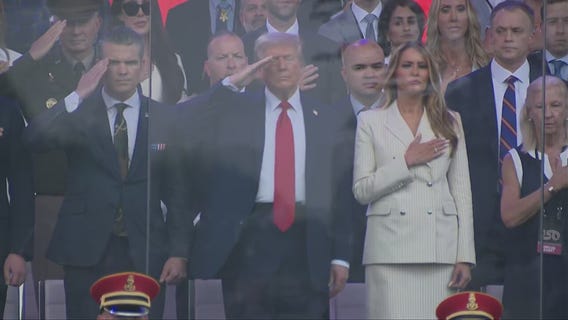 Military parade: Trump salutes during national anthem