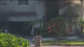 Car speeding down Kissimmee street crashes into home, sets it on fire