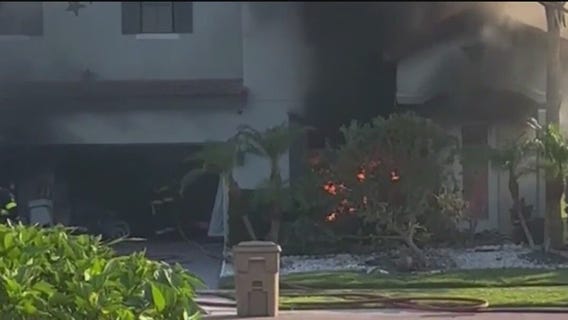 Car speeding down Kissimmee street crashes into home, sets it on fire
