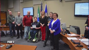 Man in wheelchair honored for helping officer