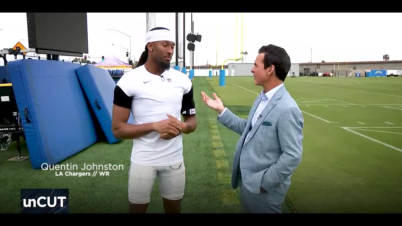 Quentin Johnston of the LA Chargers' catches up with Kyle Kraska
