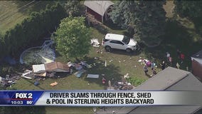 Driver slams through fence, shed and pool in Sterling Heights backyard