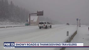 Snowy roads and Thanksgiving travelers
