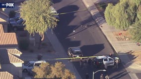 Armed suspect shot by Surprise officers