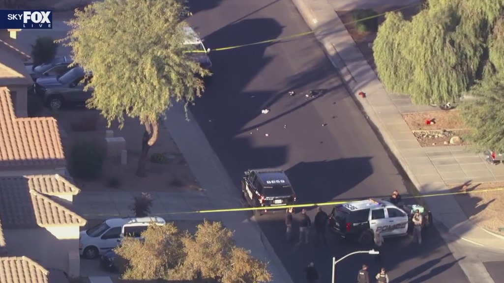 Armed suspect shot by Surprise officers