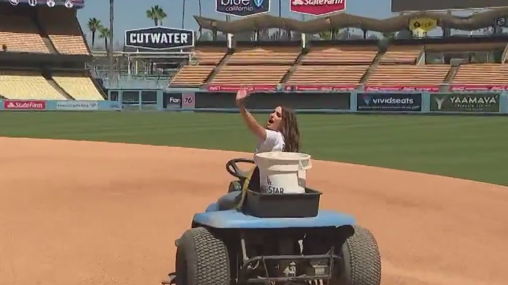 Jenn teams up with the Dodgers' groundskeeping team