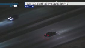 Pursuit driver speeds past other cars on 110 freeway