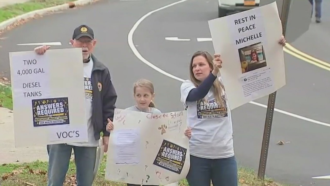 Students and parents protest outside school