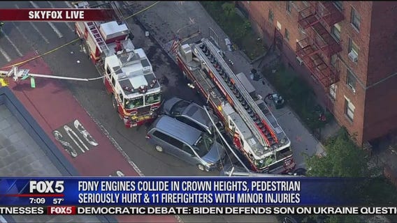 Fire trucks collide injuring pedestrian, firefighters