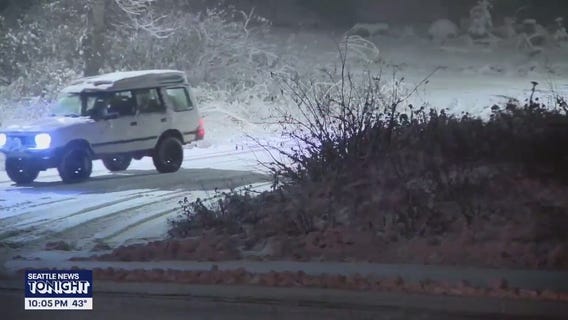 Travelers brace for snowy conditions over Snoqualmie Pass in WA