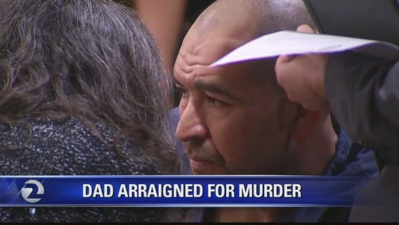 Dad arraigned in daughter's death