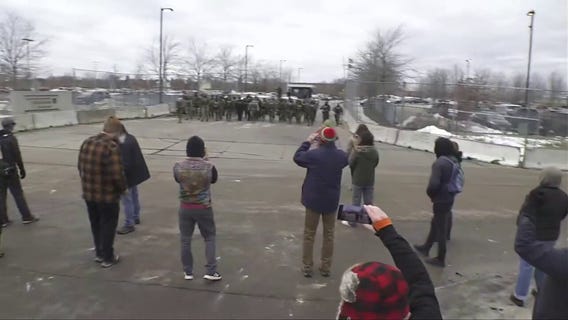 Protesters, feds clash outside Whipple Buidling