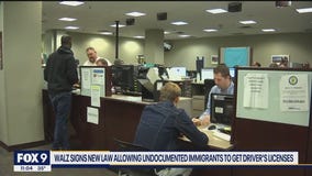 Gov. Tim Walz signs new driver's licenses for all law