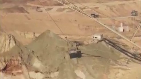 U.S. economy shrinks, U.S. and Ukraine reach rare minerals deal