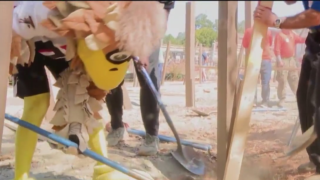 Falcons help build playground in Suwanee