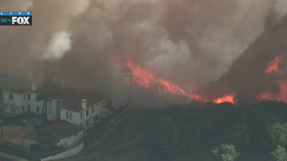 Massive fire spreads across Laguna Hills area