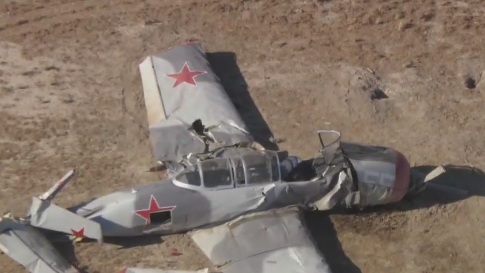 Pilot dead after planes crash mid-air