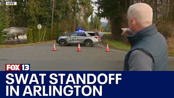 SWAT in standoff with Arlington man accused of shooting at neighbor?s house