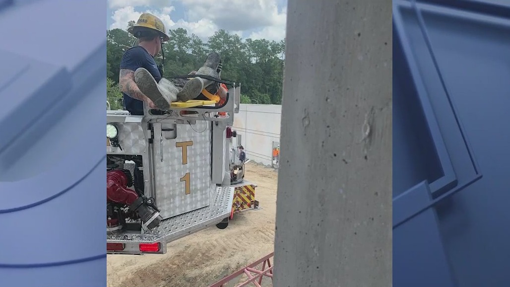 Firefighters rescue worker after fall