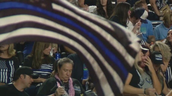 Saugus fans fill stands with 'Thin Blue Line' flags after football team no longer taking field with flag