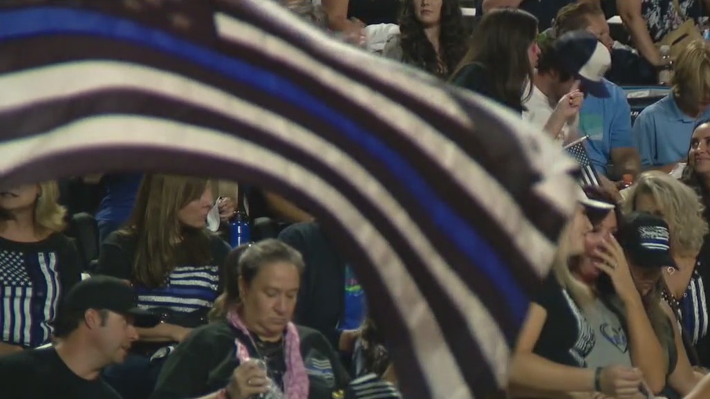 Saugus fans fill stands with 'Thin Blue Line' flags after football team no longer taking field with flag