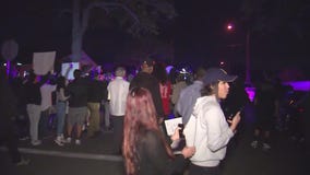 Protesters gather outside home of off-duty LAPD officer