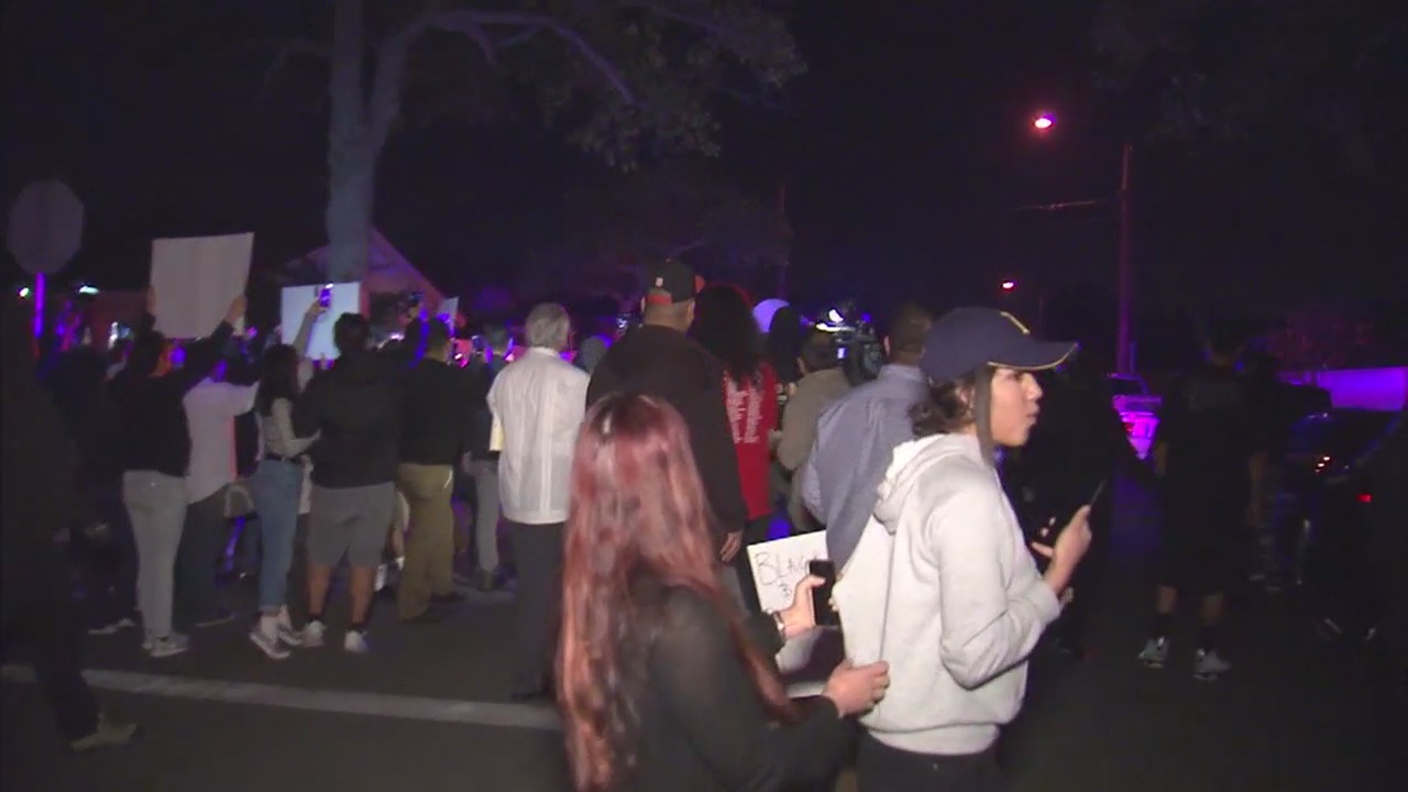 Protesters gather outside home of off-duty LAPD officer