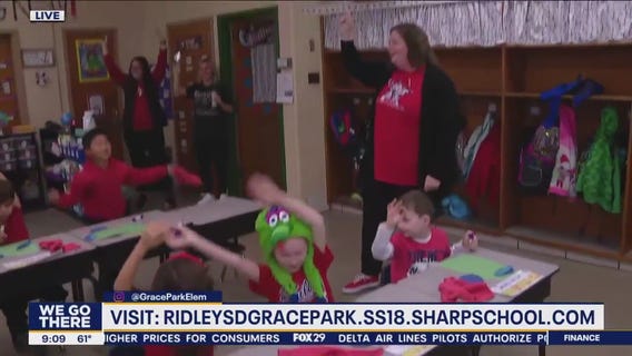 First-graders at Grace Park Elementary School cheer on the Fightin' Phils