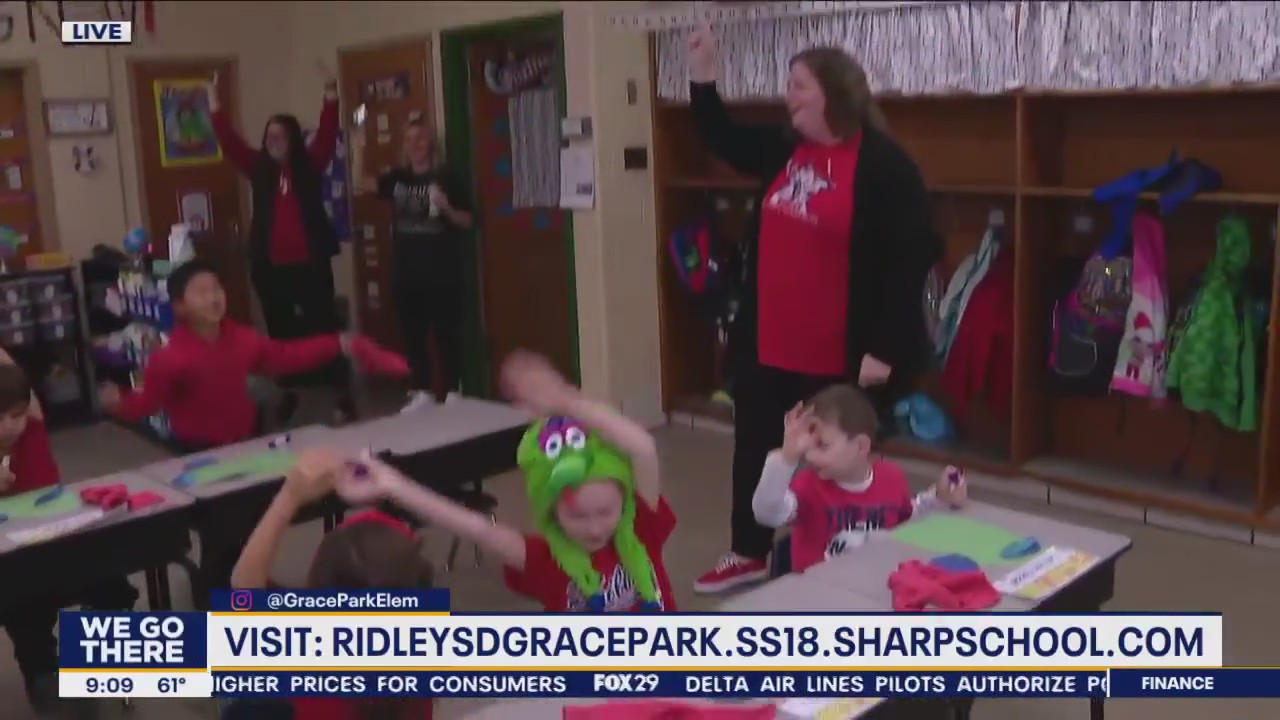 First-graders at Grace Park Elementary School cheer on the Fightin' Phils