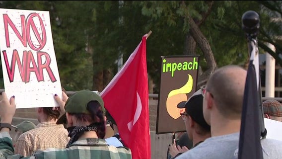 Demonstrators march through downtown Phoenix following Venezuelan strikes, presidential capture