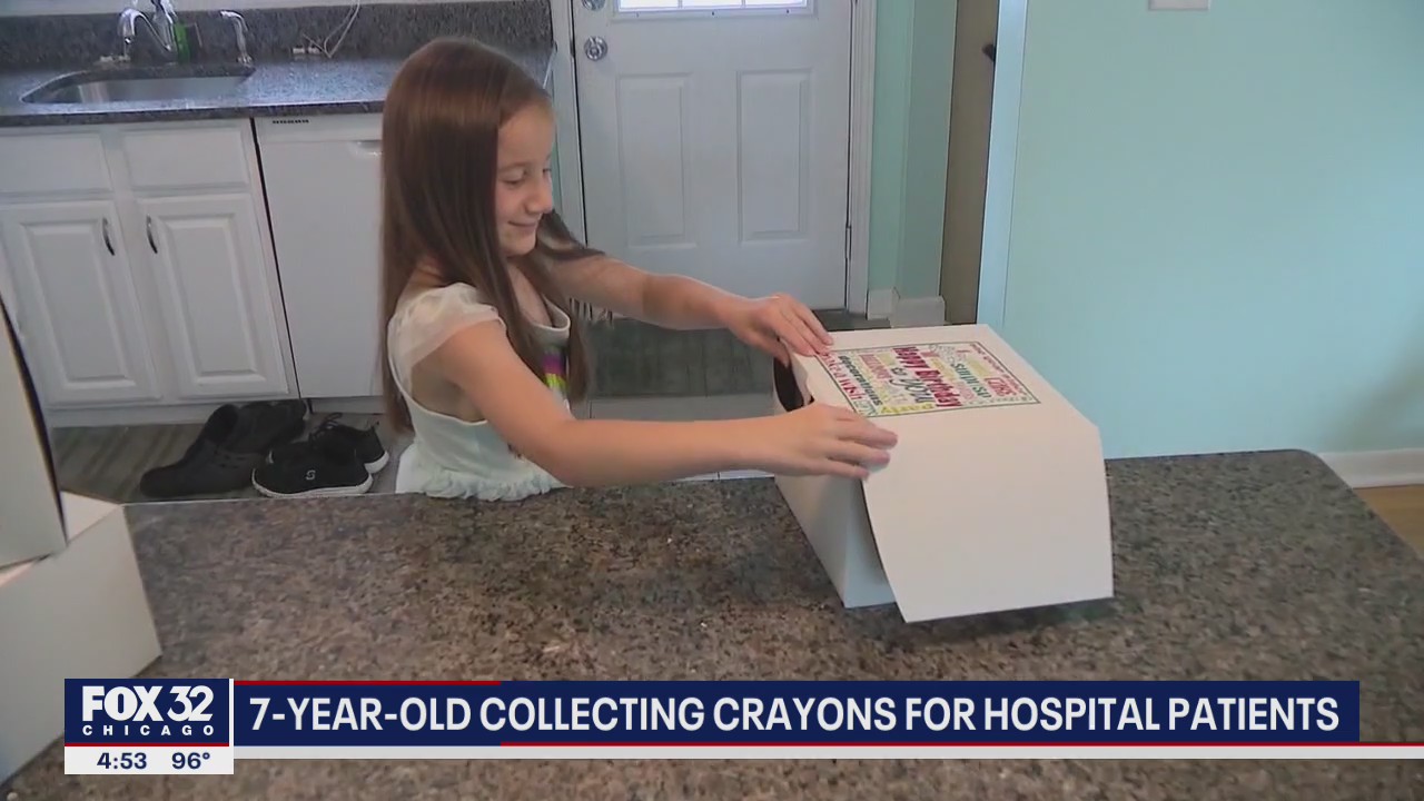 7-year-old suburban girl collecting crayons for hospital patients