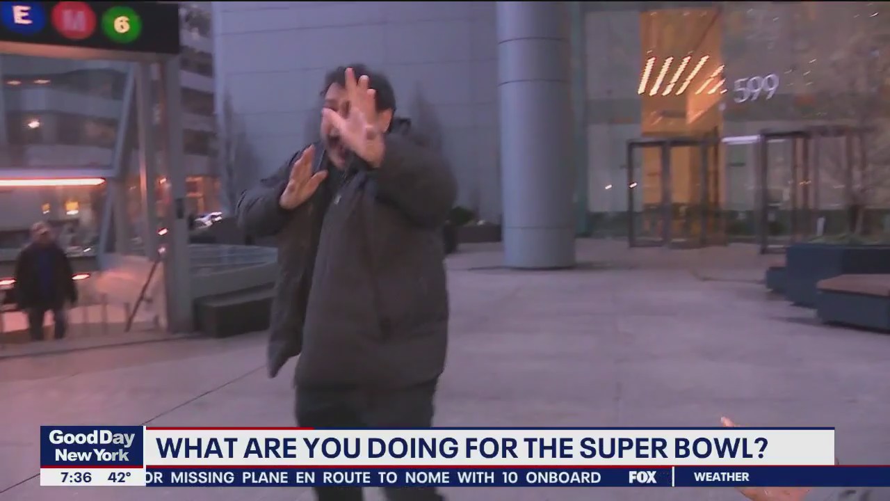 Man does good luck karate kick, 'Happy Superbowl!'