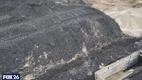 Deep pits of toxic ash along Buffalo Bayou