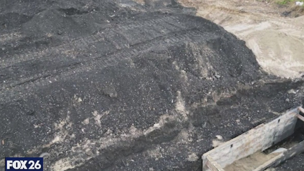 Deep pits of toxic ash along Buffalo Bayou