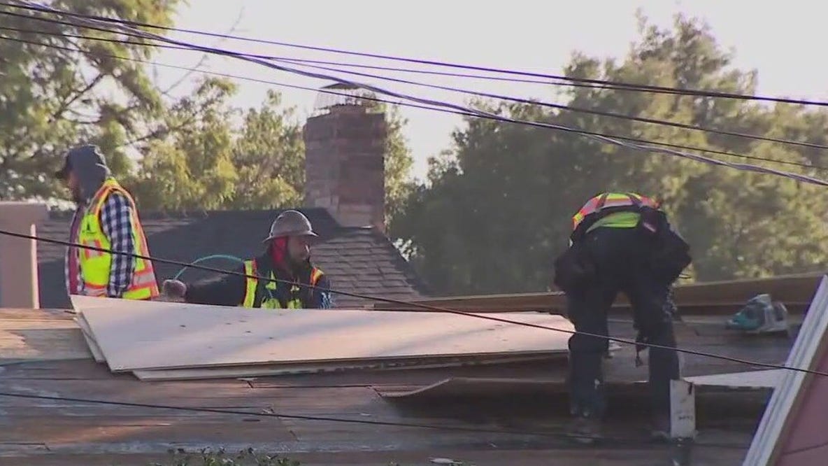 Roofers create holiday magic for Oakland homeowner