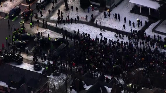 Massive crowds protest ICE after fatal shooting