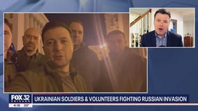 Ukrainian soldiers, volunteers fighting Russian invasion